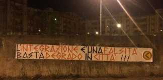 Lo Striscione di Azione Identitaria Calabria nel quartiere Ciampa a Lamezia integrazione rom fallita