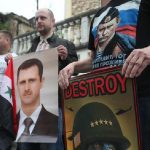 manifestanti siriani pro Assad